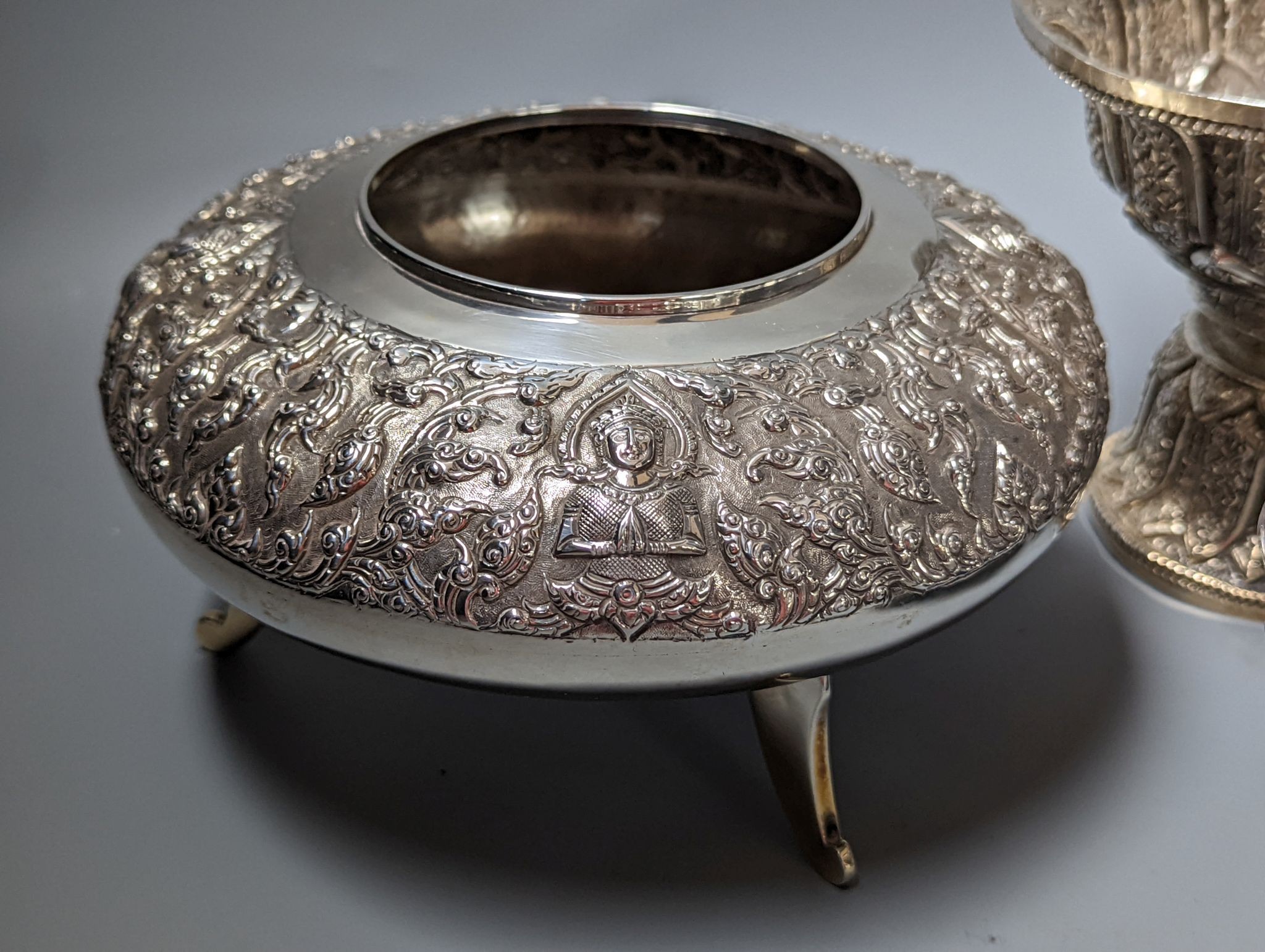 Six assorted embossed white metal bowls, including Indian and Thai, tallest 13.6cm.